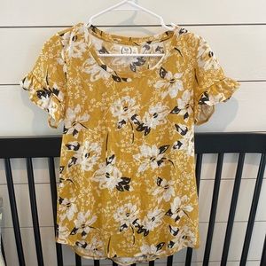 Maurice’s barely worn 24/7 top. Floral
